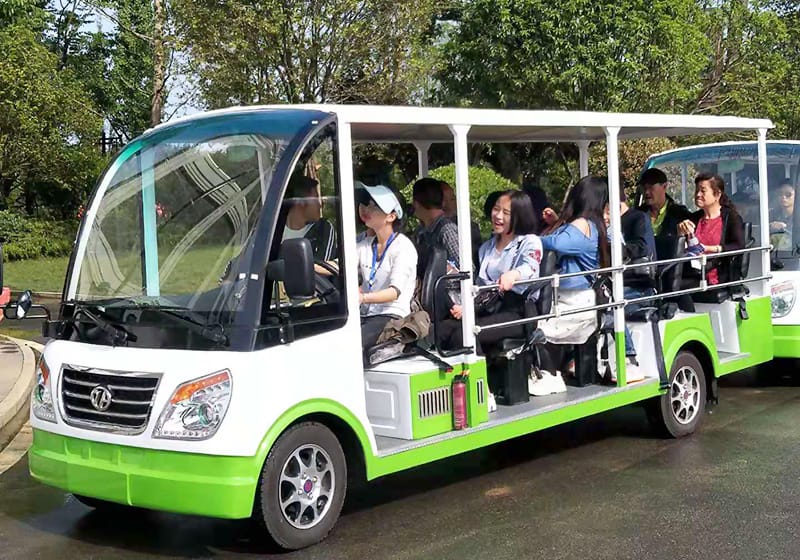 Enclosed sightseeing car with weather protection for all-season use