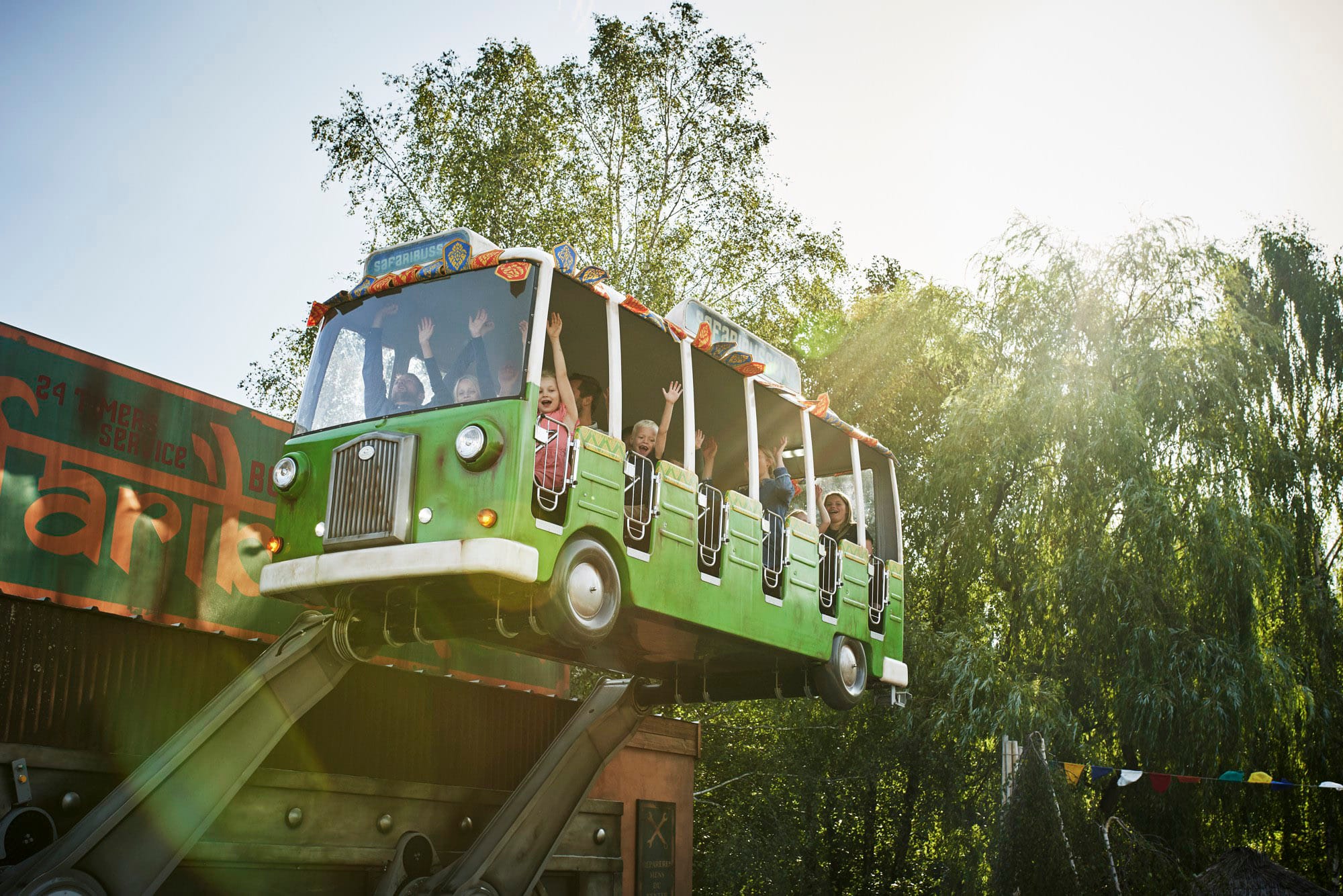 Crazy Bus for Sale | Family Swing Ride | 24-Rider Amusement Ride | JHRides Crazy Bus amusement park swing ride for sale - cheerful school bus theme