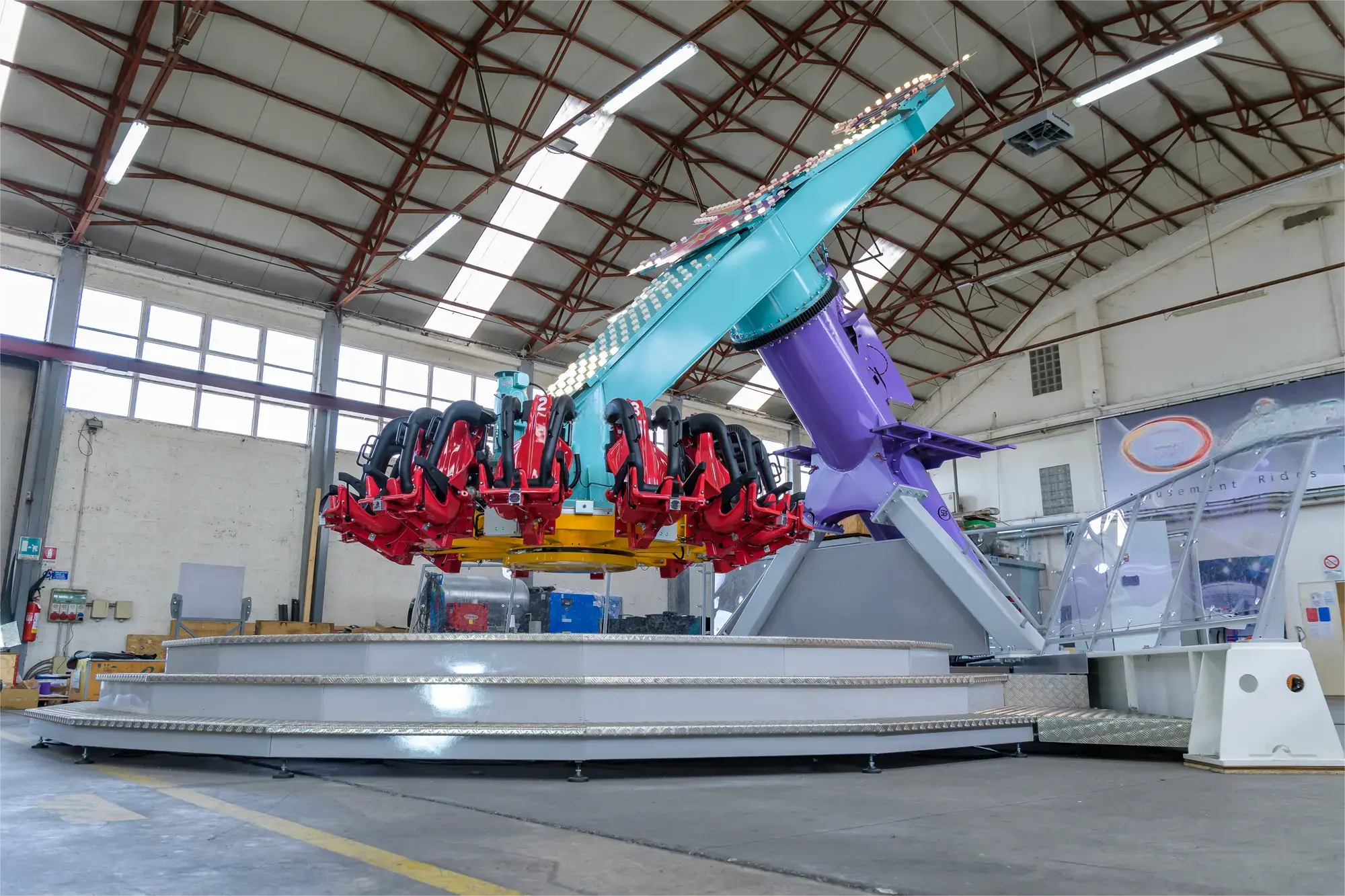 Inverting Pendulum Ride for sale – full view of the floorless frisbee structure