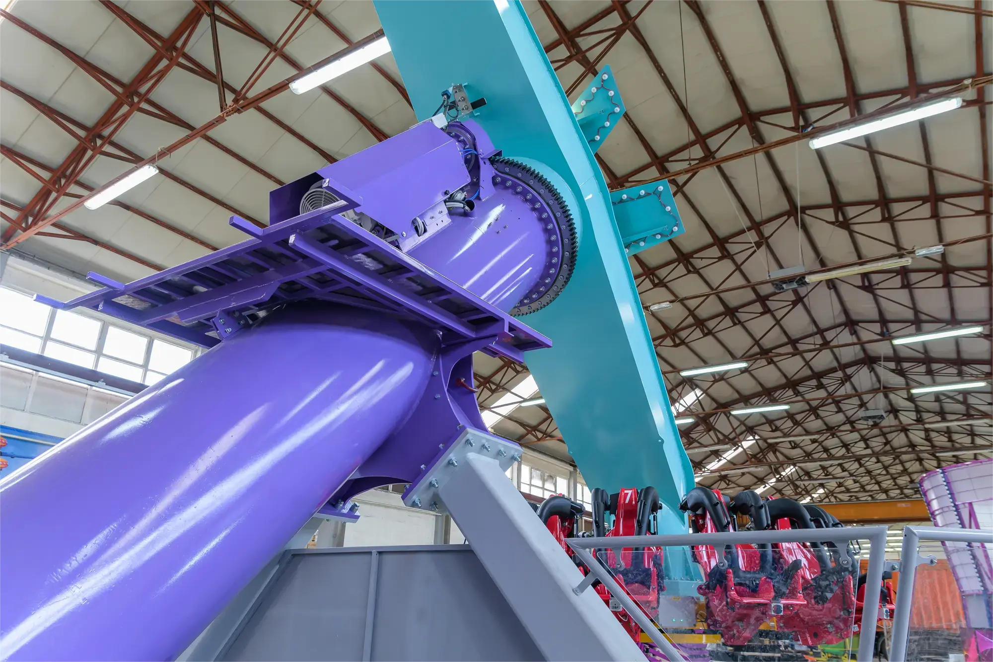 Pendulum ride seat with over-shoulder restraint system