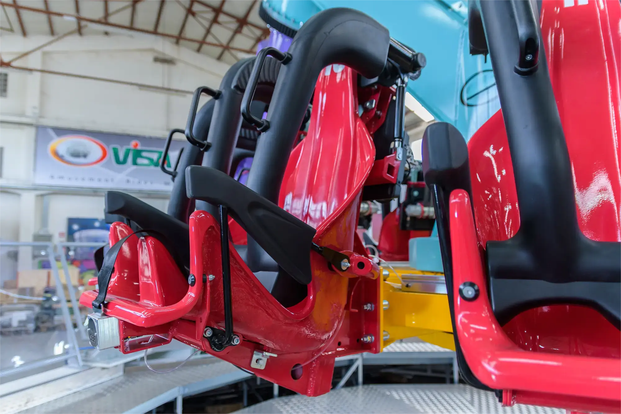Factory assembly of pendulum ride gondola and swing arm