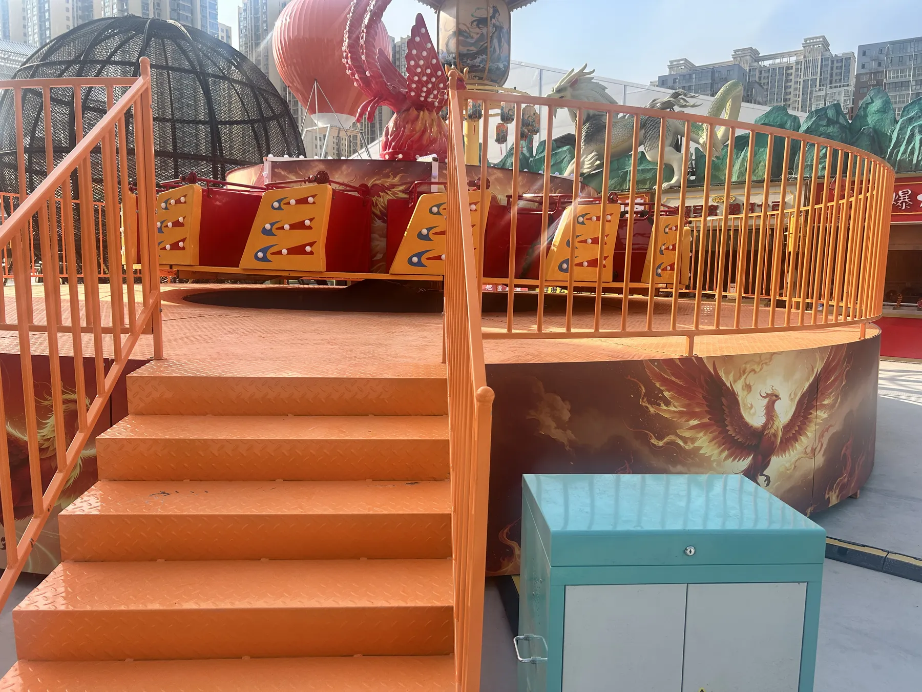 Fire Phoenix flying turntable ride installed and running at a park