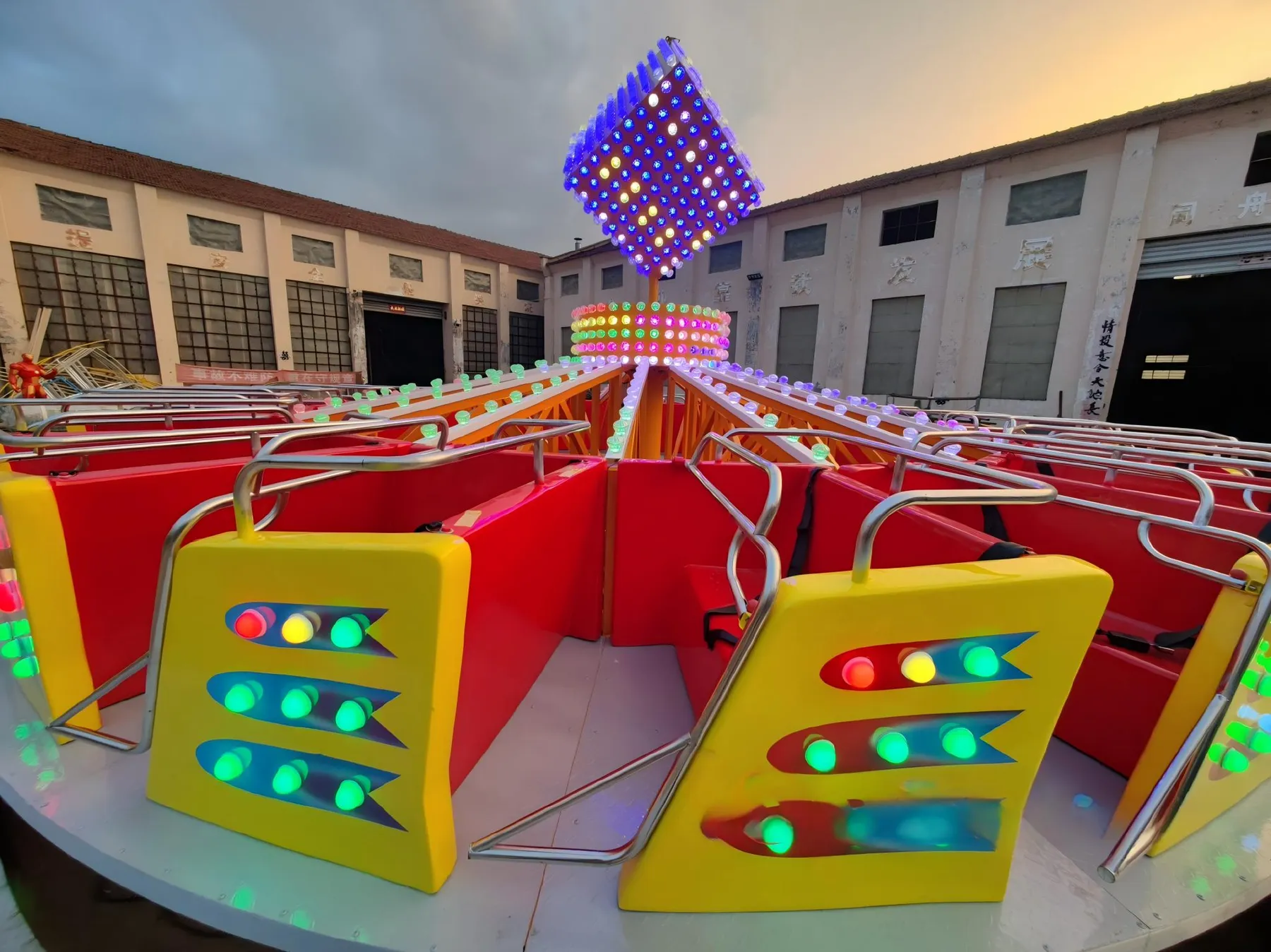 Flying turntable ride seats with lap bars and LED decoration