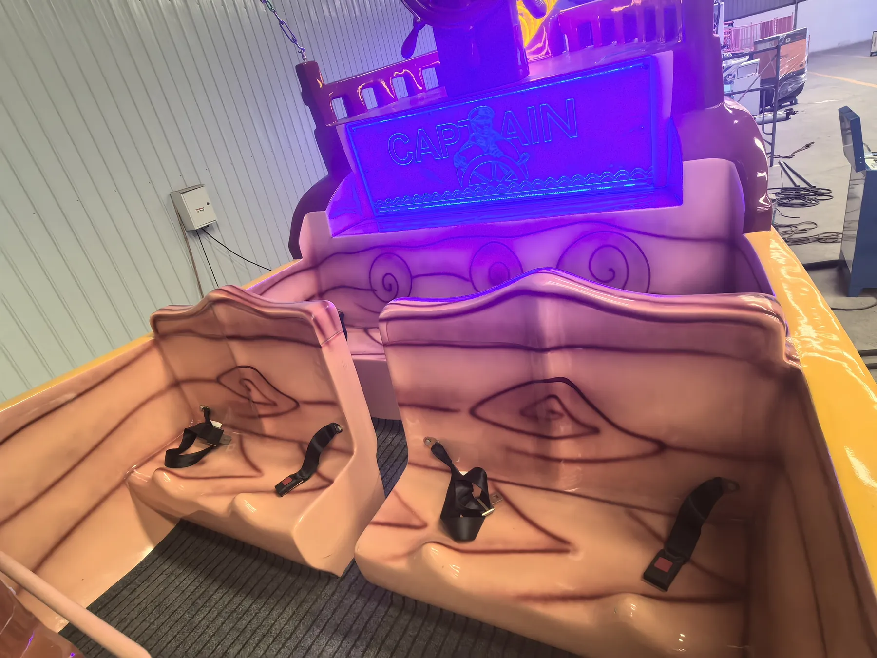 Pirate Ship Ride Manufacturer: Specs, Prices & CIF Cost FRP pirate ship cabin interior showing molded seats and seat belts