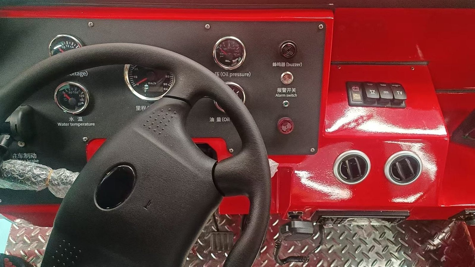 Sightseeing Train from China: The Documents You Need Dashboard of a diesel sightseeing train cab showing oil pressure, water temperature and alarm controls during pre-delivery inspection